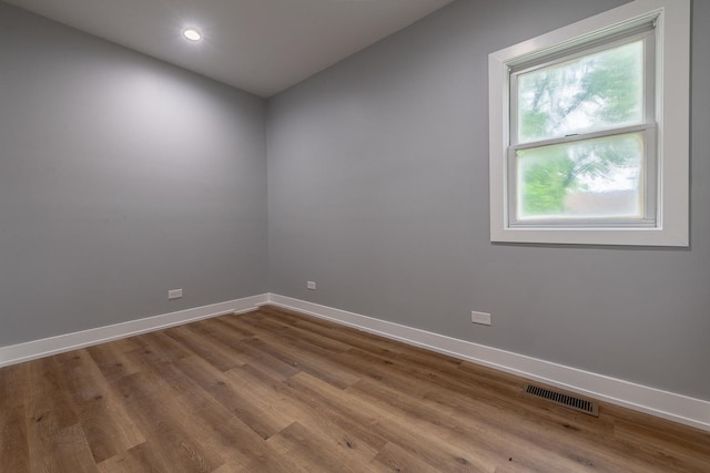 8007 S Avalon Ave, Chicago, IL 60619 - unfurnished room with wood finished floors and recessed lighting