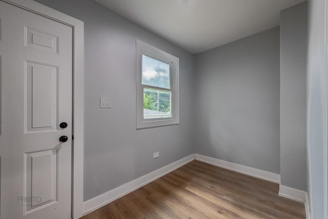 8007 S Avalon Ave, Chicago, IL 60619 - empty room featuring baseboards and wood finished floors