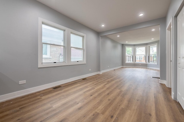 8007 S Avalon Ave, Chicago, IL 60619 - empty room with recessed lighting and wood finished floors