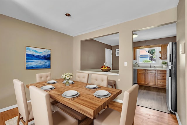 7952 Madison St Unit 2E, River Forest, IL 60305 - dining space with light wood-style flooring