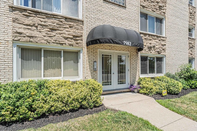 7952 Madison St Unit 2E, River Forest, IL 60305 - property entrance featuring french doors and brick siding