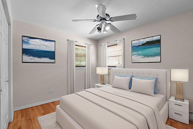 7952 Madison St Unit 2E, River Forest, IL 60305 - bedroom featuring light wood-style floors and a ceiling fan
