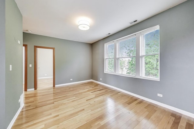 3109 W Argyle St Unit 3, Chicago, IL 60625 - empty room featuring light wood-style flooring and baseboards