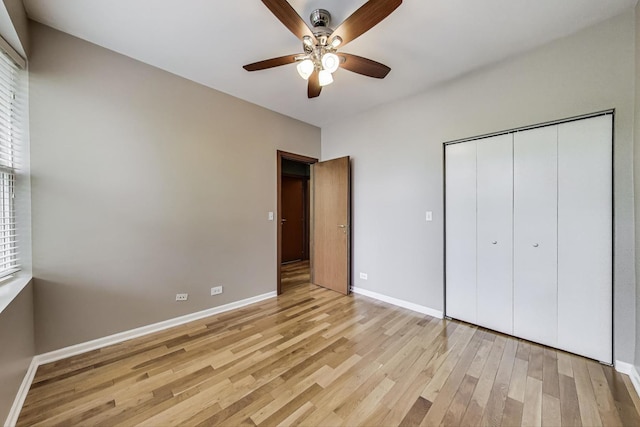 3109 W Argyle St Unit 3, Chicago, IL 60625 - unfurnished bedroom featuring light wood-style flooring, a closet, and ceiling fan