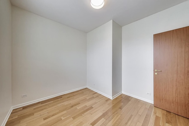 3109 W Argyle St Unit 3, Chicago, IL 60625 - unfurnished room featuring light wood-style floors and baseboards