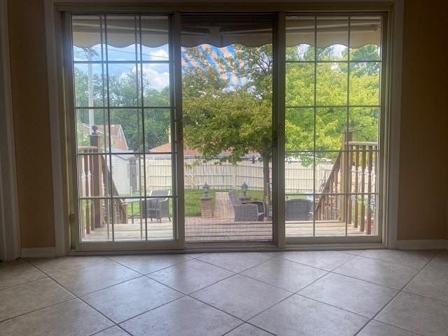 10900 S Tripp Ave, Oak Lawn, IL 60453 - doorway featuring healthy amount of natural light and tile patterned flooring