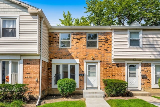 3075 Kingston Ct, Streamwood, IL 60107 - view of property with brick siding and entry steps