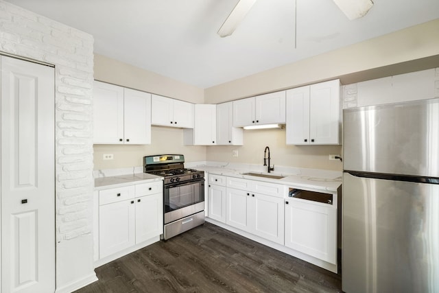3075 Kingston Ct, Streamwood, IL 60107 - kitchen with appliances with stainless steel finishes, light stone countertops, dark wood finished floors, and white cabinets
