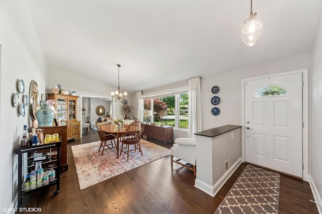 3245 Greenbriar Dr, Glenview, IL 60025 - entrance foyer with a chandelier, lofted ceiling, and dark wood-type flooring