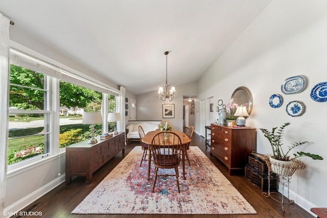 3245 Greenbriar Dr, Glenview, IL 60025 - dining area with a chandelier, vaulted ceiling, and dark wood-style flooring