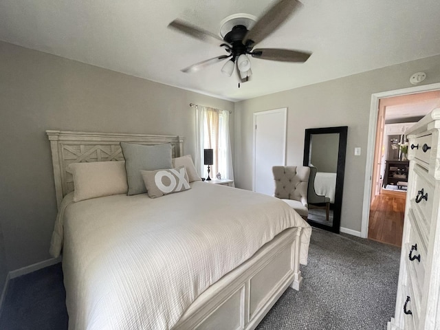 1110 Pike St, Peru, IL 61354 - bedroom with dark carpet and a ceiling fan