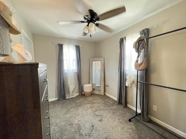 1110 Pike St, Peru, IL 61354 - unfurnished bedroom with carpet and ceiling fan