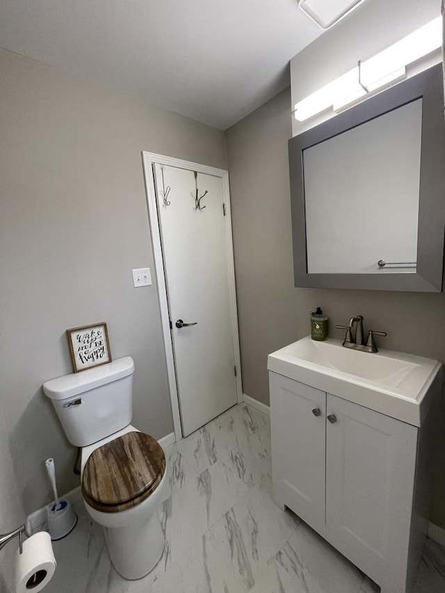 1110 Pike St, Peru, IL 61354 - bathroom with vanity and marble finish floors