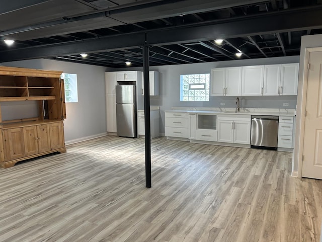 9842 S 88th Ave, Palos Hills, IL 60465 - below grade area featuring freestanding refrigerator and light wood finished floors
