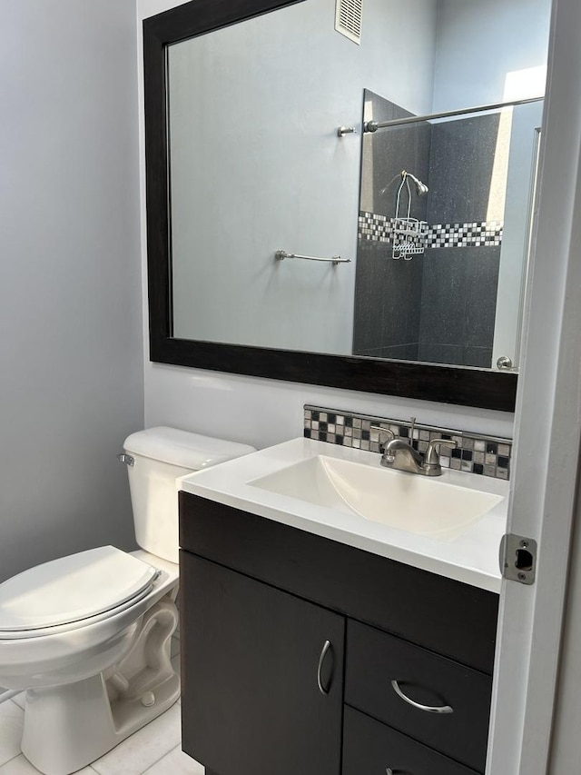 9842 S 88th Ave, Palos Hills, IL 60465 - full bath featuring vanity, a tile shower, and tile patterned flooring