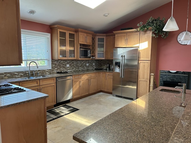 9842 S 88th Ave, Palos Hills, IL 60465 - kitchen with appliances with stainless steel finishes, tasteful backsplash, hanging light fixtures, lofted ceiling, and glass insert cabinets