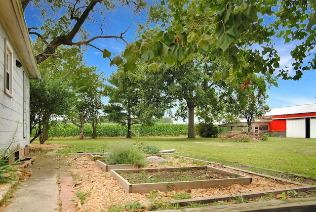 2840 W Ziebarth Rd, Normal, IL 61761 - view of green lawn featuring a vegetable garden