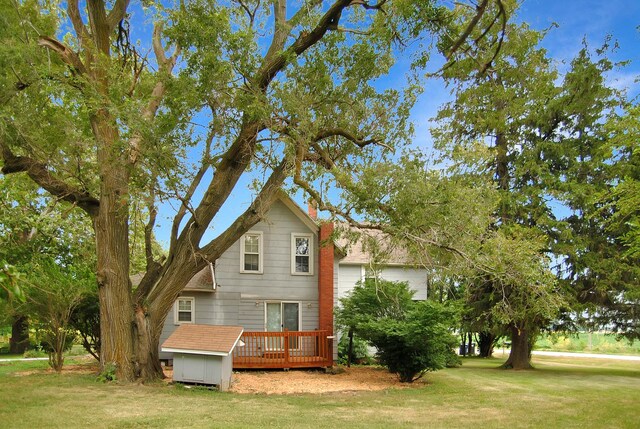 2840 W Ziebarth Rd, Normal, IL 61761 - rear view of house featuring a wooden deck and a yard