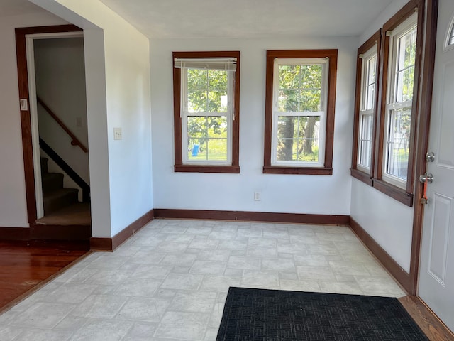 2840 W Ziebarth Rd, Normal, IL 61761 - empty room with stairs and stone finish floors