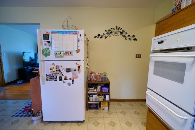 4444 N Central Ave Unit 2W, Chicago, IL 60630 - kitchen with white appliances and a warming drawer
