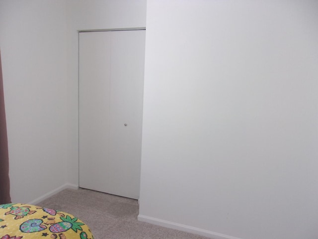 570 Windsor Dr Unit 570, Fox Lake, IL 60020 - unfurnished bedroom with carpet floors and a closet