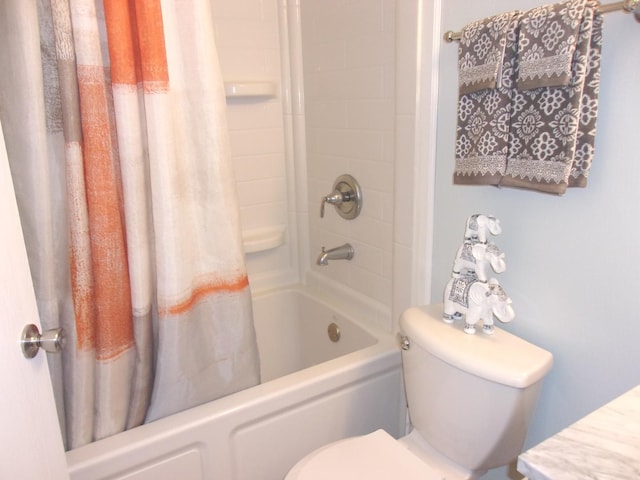 570 Windsor Dr Unit 570, Fox Lake, IL 60020 - bathroom featuring shower / bath combination with curtain and toilet