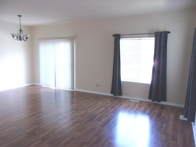 570 Windsor Dr Unit 570, Fox Lake, IL 60020 - empty room featuring a chandelier and wood finished floors