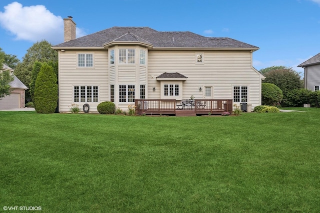 1600 Elderberry Dr, Libertyville, IL 60048 - back of property with a chimney, a deck, and a lawn