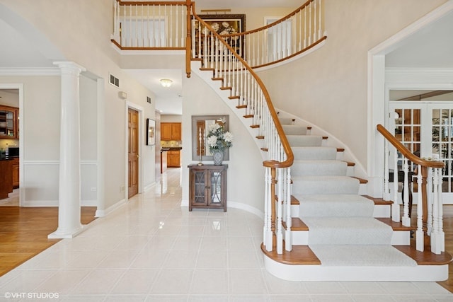 1600 Elderberry Dr, Libertyville, IL 60048 - stairs featuring decorative columns and a towering ceiling