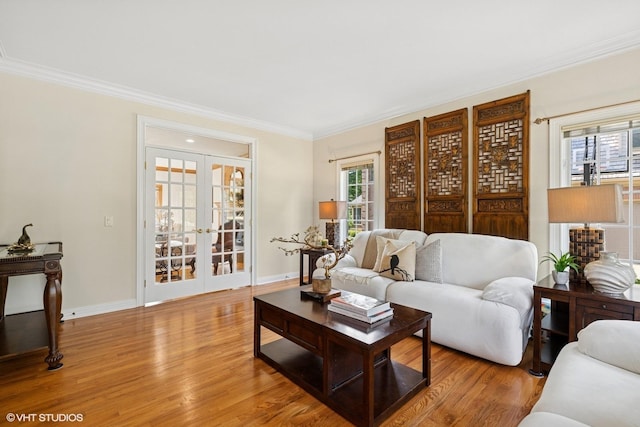 1600 Elderberry Dr, Libertyville, IL 60048 - living room with french doors, crown molding, healthy amount of natural light, and light wood finished floors