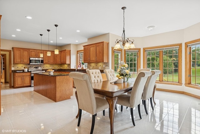 1600 Elderberry Dr, Libertyville, IL 60048 - dining space featuring recessed lighting, light tile patterned floors, and a chandelier