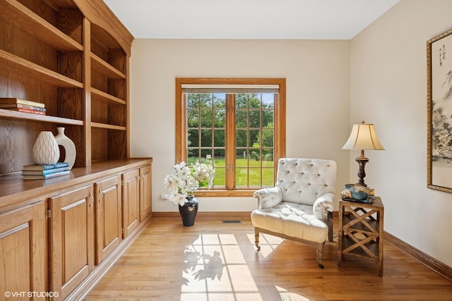 1600 Elderberry Dr, Libertyville, IL 60048 - living area with light wood finished floors and baseboards