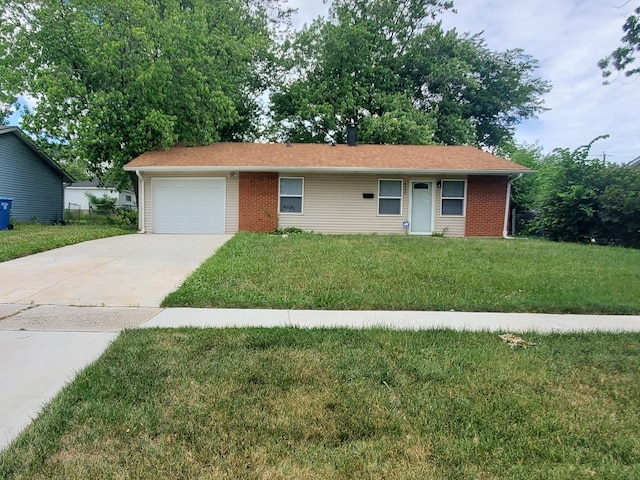 2053 219th Pl, Sauk Village, IL 60411 - ranch-style house with driveway, an attached garage, a front yard, and brick siding