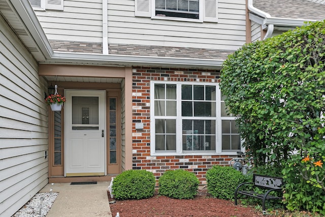 229 Ascot Ln, Streamwood, IL 60107 - view of exterior entry featuring brick siding