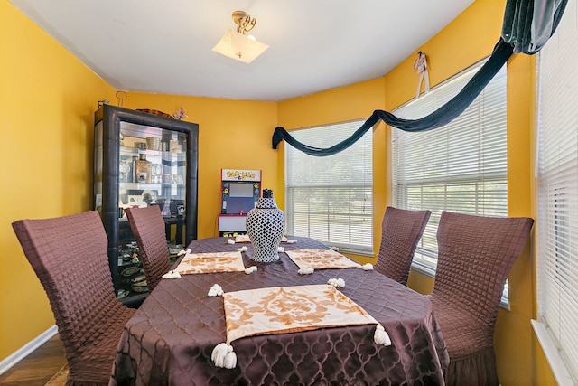 229 Ascot Ln, Streamwood, IL 60107 - dining space featuring wood finished floors and a skylight
