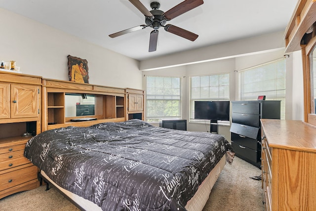 229 Ascot Ln, Streamwood, IL 60107 - bedroom with light colored carpet and a ceiling fan