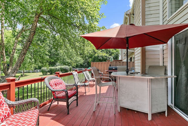 229 Ascot Ln, Streamwood, IL 60107 - wooden terrace featuring outdoor dining area and a fenced backyard