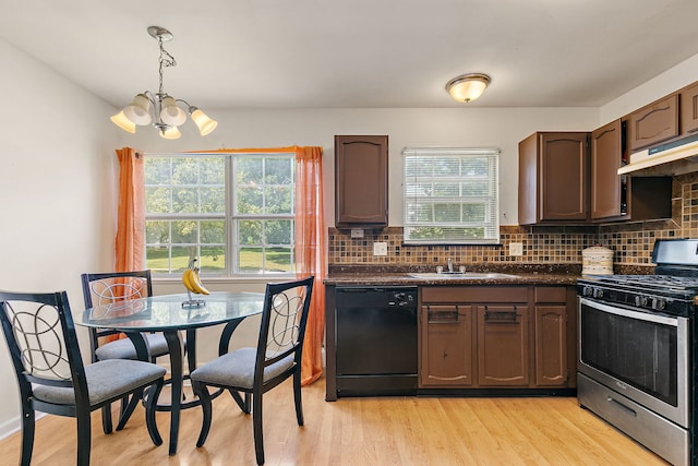 229 Ascot Ln, Streamwood, IL 60107 - kitchen featuring stainless steel gas stove, dishwasher, dark countertops, and a chandelier