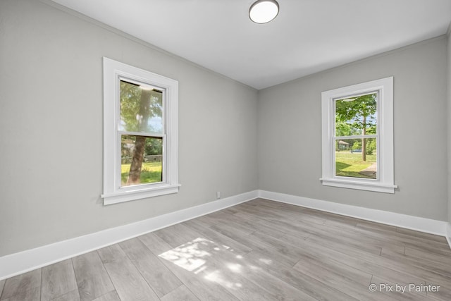 2213 Elm St, Rockford, IL 61102 - spare room with wood finished floors and ornamental molding