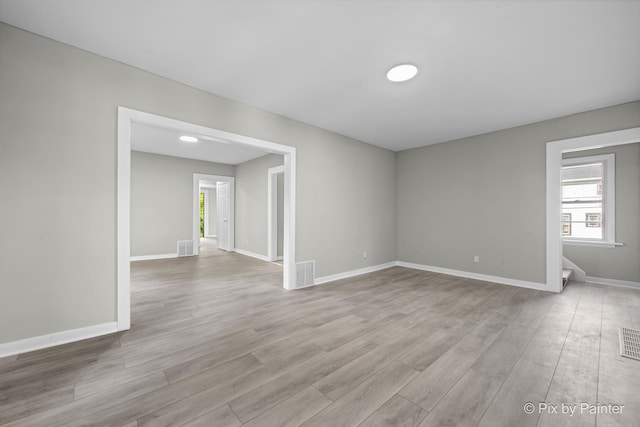 2213 Elm St, Rockford, IL 61102 - unfurnished room with wood finished floors and plenty of natural light