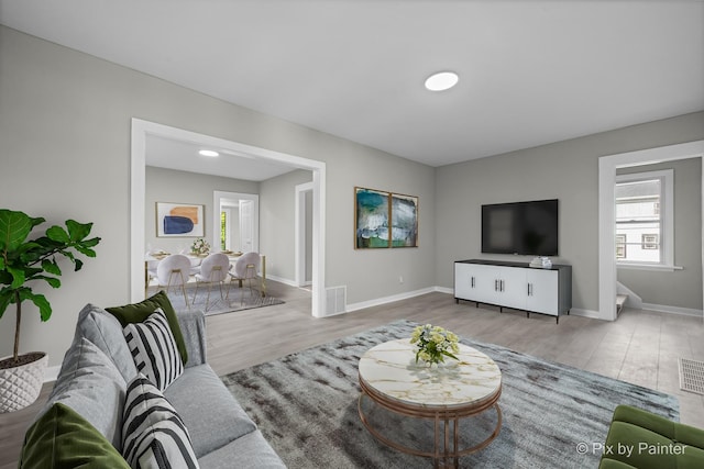 2213 Elm St, Rockford, IL 61102 - living area with wood finished floors and baseboards