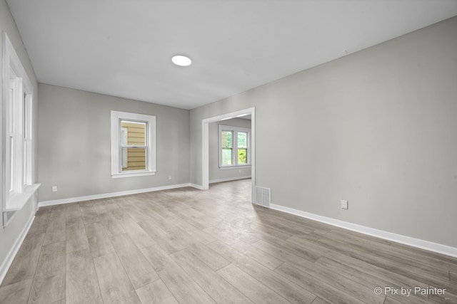 2213 Elm St, Rockford, IL 61102 - empty room featuring light wood-style flooring and baseboards
