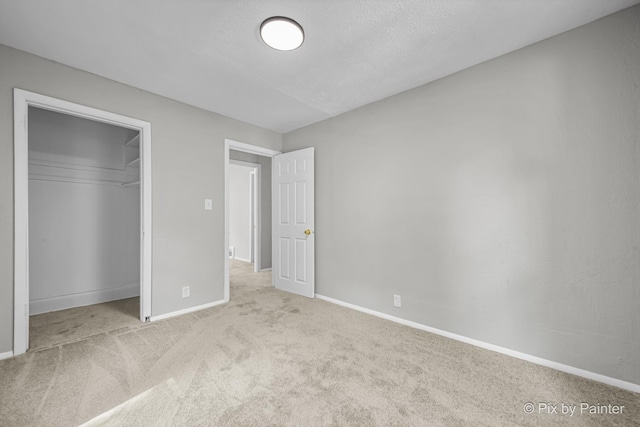 2213 Elm St, Rockford, IL 61102 - unfurnished bedroom featuring carpet flooring and a closet