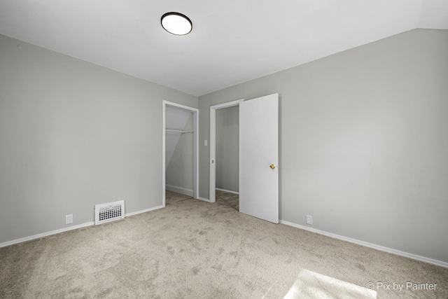 2213 Elm St, Rockford, IL 61102 - unfurnished bedroom with carpet floors and a closet