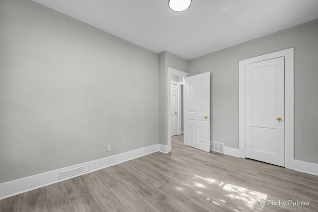 2213 Elm St, Rockford, IL 61102 - unfurnished bedroom featuring wood finished floors and baseboards
