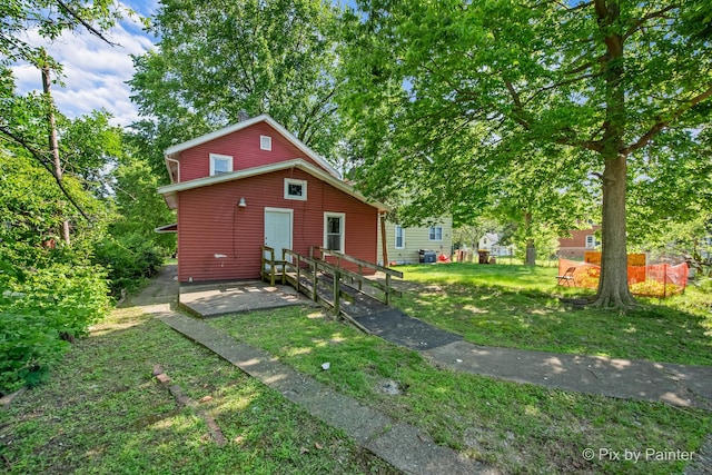 2213 Elm St, Rockford, IL 61102 - view of front of property featuring a front yard
