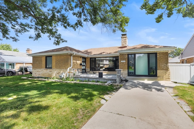 4944 Jarvis Ave, Skokie, IL 60077 - ranch-style house featuring brick siding and a chimney