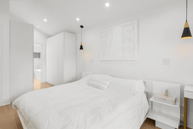 4944 Jarvis Ave, Skokie, IL 60077 - bedroom with wood finished floors, recessed lighting, and ensuite bathroom