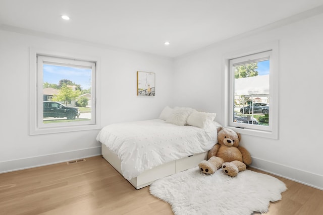4944 Jarvis Ave, Skokie, IL 60077 - bedroom with light wood finished floors and recessed lighting