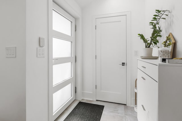 4944 Jarvis Ave, Skokie, IL 60077 - entryway with light tile patterned floors